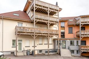 Appartements Ourea - duplex avec balcon : photos des chambres