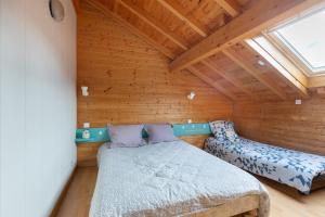 Appartements Kione - duplex avec terrasse : photos des chambres