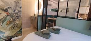 Appartements Magnifique T2 centre ville 5 min a pieds des Arenes de Nimes : photos des chambres