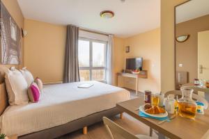 Appart'hotels Zenitude Hotel-Residences Magny-les-Hameaux : photos des chambres