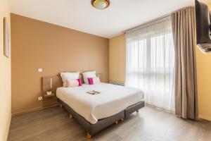 Appart'hotels Zenitude Hotel-Residences Magny-les-Hameaux : photos des chambres