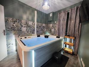 Appartements Jacuzzi privatif - Suite Amazonie - 1 ou 2 chambres : photos des chambres