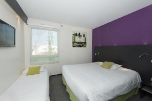 Hotels Kyriad Direct Limoges Nord : - 1 lit double + 1 lit simple 