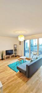 Appartements Grand Appart Cosy Gare Paris 4 pers Wifi : photos des chambres