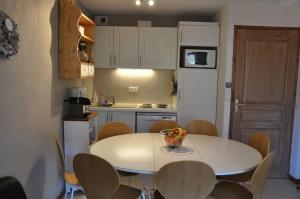 Appartement cosy Peisey Les Arcs 6-8 pers - piscine sauna - en face des pistes