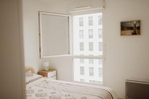 Appartements Bel appartement climatise avec place de parking : photos des chambres
