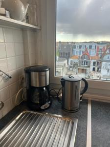 Appt plein centre , face mer avec parking