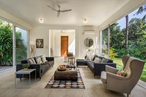 SaffronStays Hacienda by the Sea - 5BR Spanish-style pet & elder-friendly pool villa with lawns, beach access & BBQ nights
