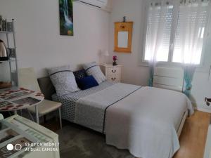 Sejours chez l'habitant CHAMBRE CONFORTABLE,Pres Gare,CLIM,PARKING,pt dejeuner : photos des chambres