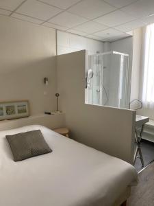 Hotels Grand Hotel De La Poste : photos des chambres