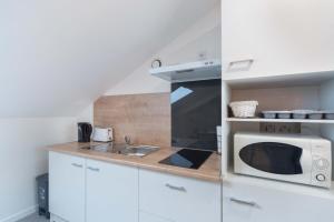 Appartements Le Cocon des Marins : photos des chambres