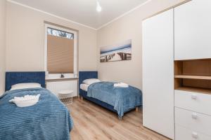 Spacious Apartment near Wolin National Park by Noclegi Renters