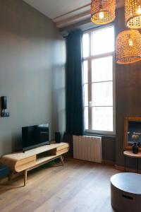 Appartements Le petit Carriere : photos des chambres