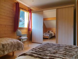 Chalets Les Joyeux Randonneurs proche Gerardmer : photos des chambres