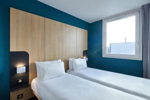 Hotels B&B HOTEL Paris Nord Gonesse Parc des Expos : photos des chambres