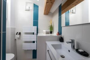 Appartements Le Coq Charmant petit studio en centre ville d'Embrun : photos des chambres