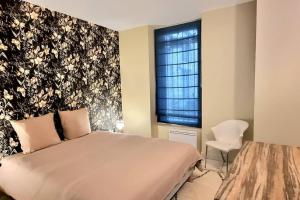 Appartements Petale de Rose - Spacieux T2 - Calme - RDC : photos des chambres