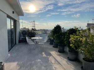 Athens Neos Kosmos penthouse, sea and city view