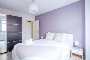 Appartements Le Lys - Wifi - 10 min centre ville : photos des chambres