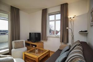 hafennahe Ferienwohnung mit Balkon und Meerblick - Hafenhäuser Breege FeWo 11