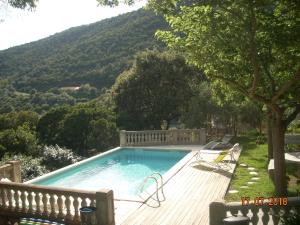 Sejours chez l'habitant CHAMBRE INDEPENDANTE climatisee, cuisine d'ete, piscine : photos des chambres