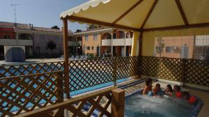 Holiday village escape with garden and fireplace