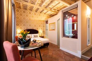 Deluxe Room with Balcony room in Le Suite del Barone