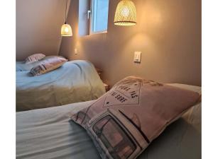 Maisons de vacances LES PORTSALLAISES piscine ou spa a 300m de la plage : photos des chambres