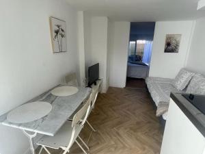Appartements Appart cosy avec terrasse : photos des chambres