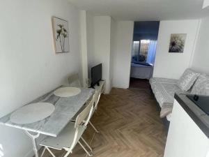 Appartements Appart cosy avec terrasse : photos des chambres