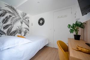 Appartements Les Maisons Acajou : photos des chambres