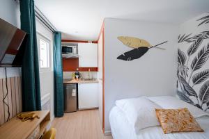 Appartements Les Maisons Acajou : photos des chambres