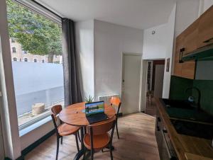 Appartements Logement centre ville avec cour et vue sur canal : photos des chambres