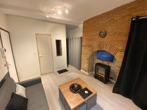 Appartements Au P'tit Loft - Wifi fibre - Orange TV - Hyper Centre - Gare : photos des chambres