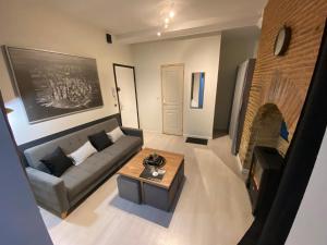 Appartements Au P'tit Loft - Wifi fibre - Orange TV - Hyper Centre - Gare : photos des chambres