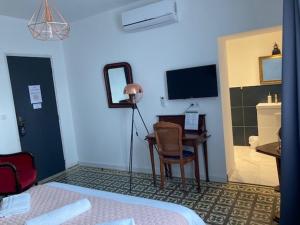 Hotels Hotel La Demeure Coloniale : photos des chambres