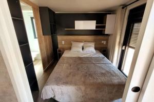 Campings Modele d'exception, 3 ch, 2 sdb, 43m2 - proche parc aquatique : photos des chambres