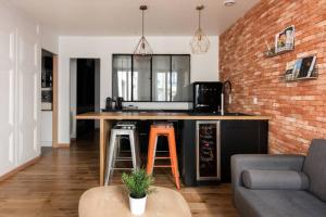 Appartements Appartement type loft a Bellecour : photos des chambres