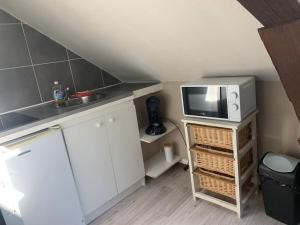 Appartements Petit studio tout confort : photos des chambres