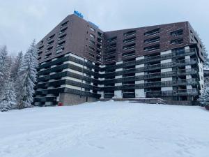 Alpin Resort Hotel - Apartamentele 2403-2404- proprietate administrata de gazda privata