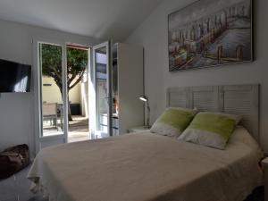 T2 bis rénové à Arcachon centre avec 2 terrasses, clim, parking, proche plage et gare. - FR-1-420-84