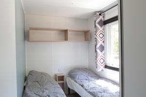 Campings CAMPING LES OURMES : photos des chambres