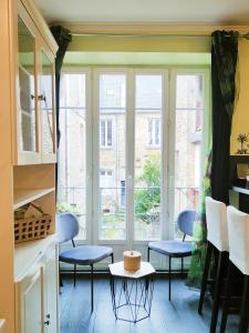 Appartements STUDIO DE L'HORLOGE : photos des chambres