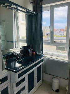 Appartements Appartement A confortable et lumineux : photos des chambres