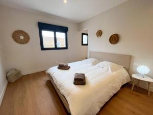 Appartements Agreable maison de village avec garage & terrasse : photos des chambres