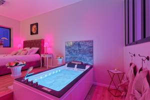 Appartements Romance Spa Nuit D'amour : photos des chambres