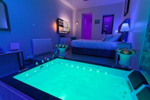 Appartements Romance Spa Nuit D'amour : photos des chambres