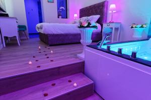 Appartements Romance Spa Nuit D'amour : photos des chambres