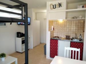 Appartements Le Petit Aurouze : photos des chambres