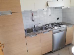 Ferienwohnung GALLO mit überdachter Terrasse Parkplatz 100 mtr z Strand